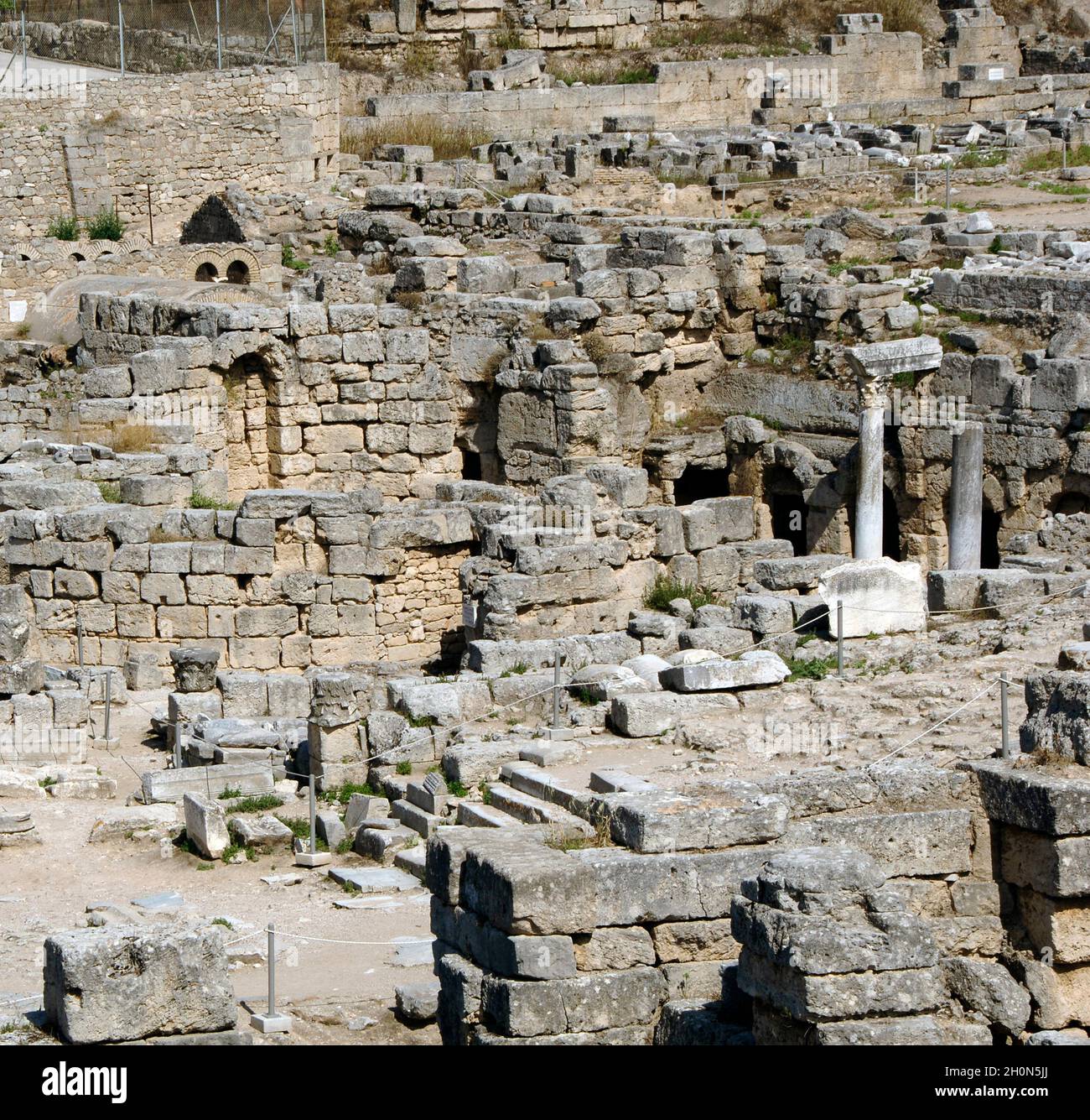 Greece Peloponnese Archaeological Site Of Corinth Ruins Stock Photo greece-peloponnese-archaeological-site-of-corinth-ruins-stock-photo