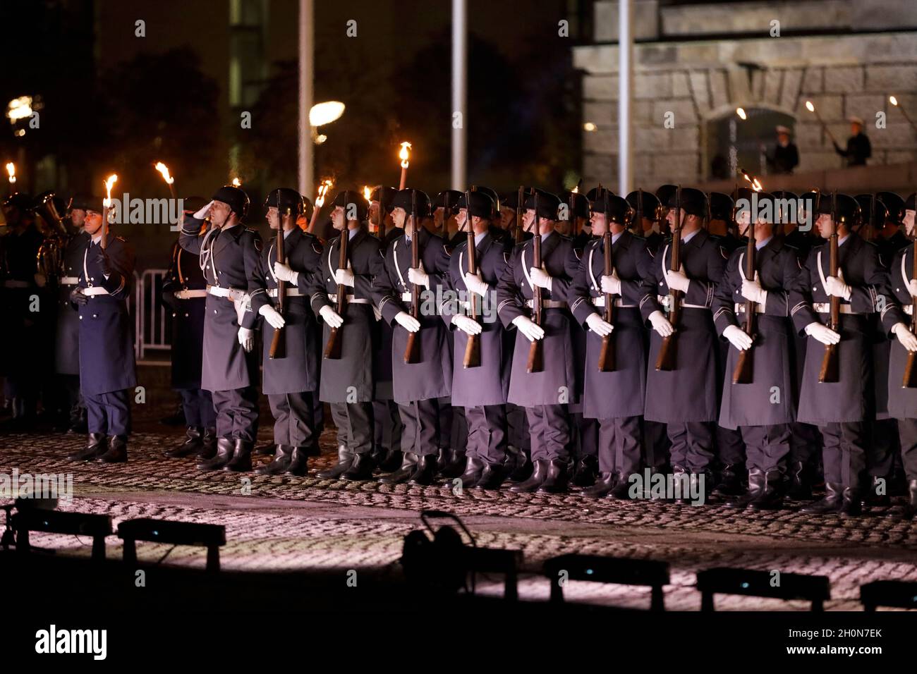 Berlin, Germany, 13th Oct, 2021.After almost twenty years, the Bundeswehr's mission in Afghanistan has finally come to an end as of August 27, 2021. The appreciation of the mission culminates with a Great Taps ceremony in front of the Reichstag in Berlin. The Great Taps is a solemn military ceremony held in the evening, performed by a special formation of military musicians, gunmen and torchbearers designated only for this purpose. Credit: Juergen Nowak / Alamy Live News. Stock Photo