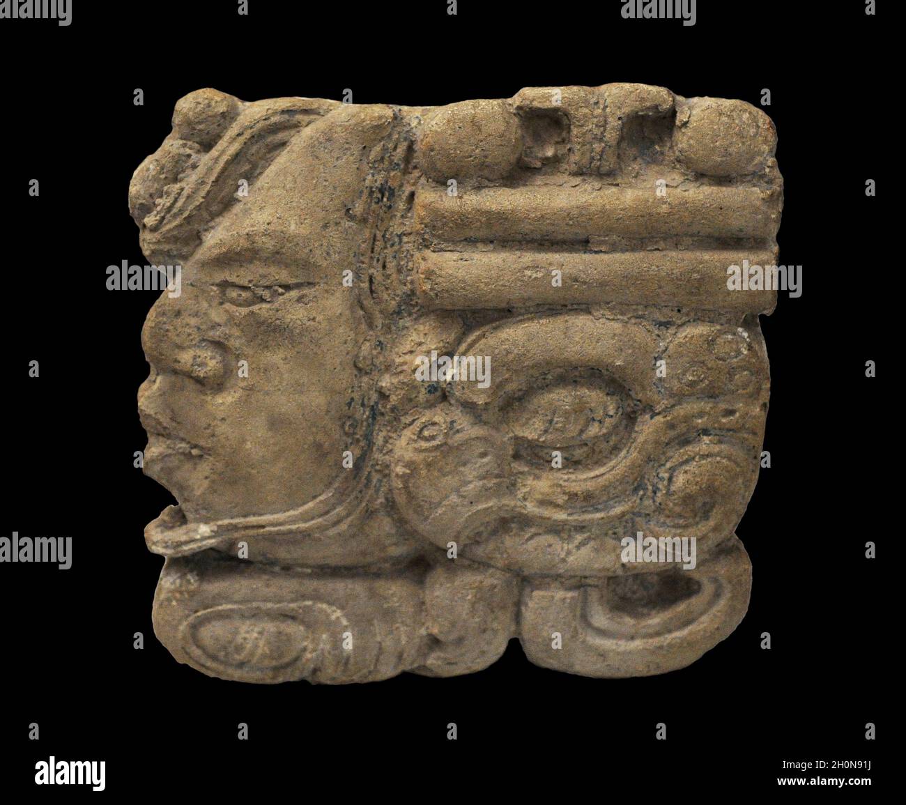 Numerical glyph depicting numeral 4. Palenque. Maya culture. Late Classic period (600-900 AD). Located on the facade of the Palace. It was collected i Stock Photo