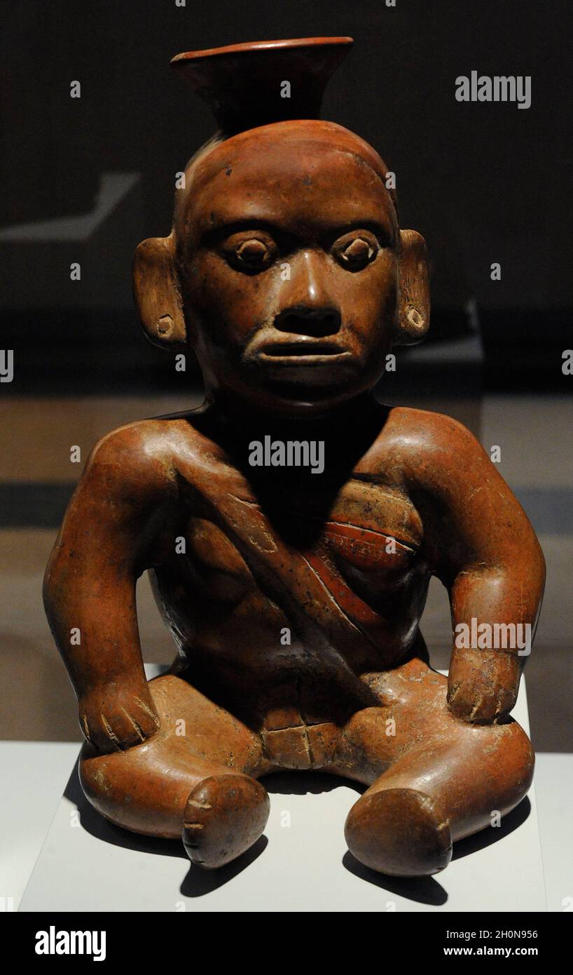 Vessel depicting a deformed character sitting. Painted ceramic. Colima style. Ancient and Middle Classic Period (100-700 AD). Western Mexico. Museum o Stock Photo