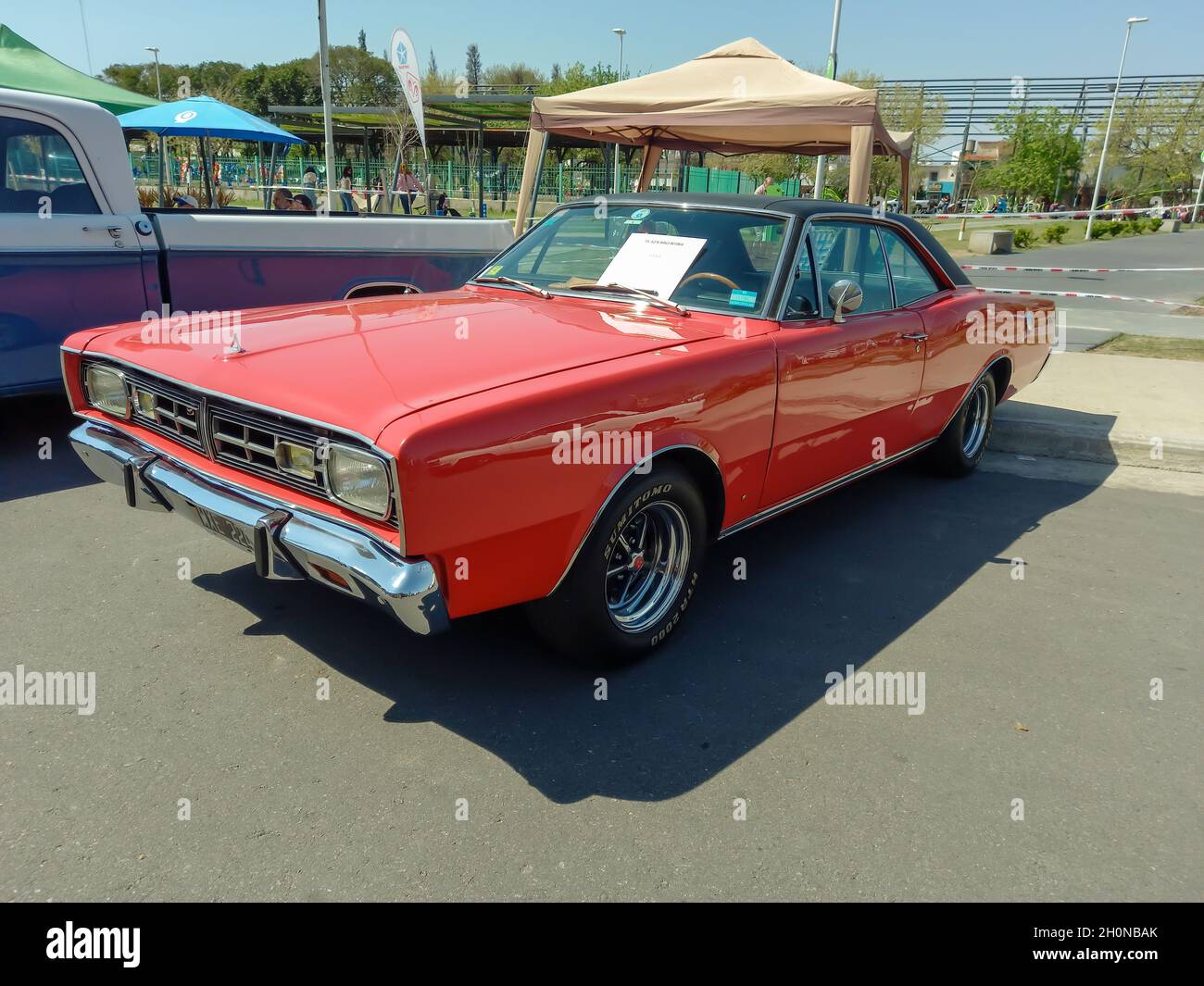 AVELLANEDA - BUENOS AIRES, ARGENTINA - Sep 27, 2021: classic 2 door red convertible coupe Dodge GTX 1970 . Sporty muscle car manufactured by Chrysler Stock Photo