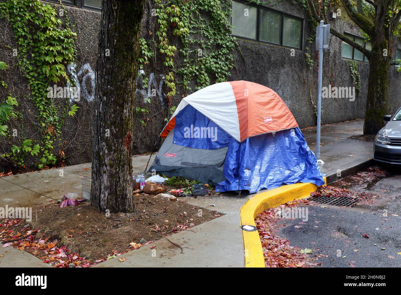 A tent on a sidewalk in the Nob Hill neighborhood of Portland, Oregon. Stock Photo