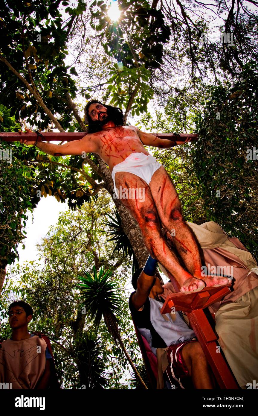 THE VIA CRUCIS OF JESUS CHRIST.On Good Friday of each year the Group Evangelizer Jesus of Nazareth Passion plays and Stations of the Cross of Jesus. The activity begins in the village church and then tour the town and make 14 stops cruxificion and end with the death of Jesus. .Carrizal, Miranda State - Venezuela 2010..(Copyright © Aaron Sosa). Stock Photo