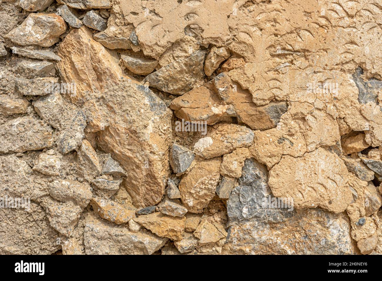 Old stone wall texture background. Close up. Stock Photo