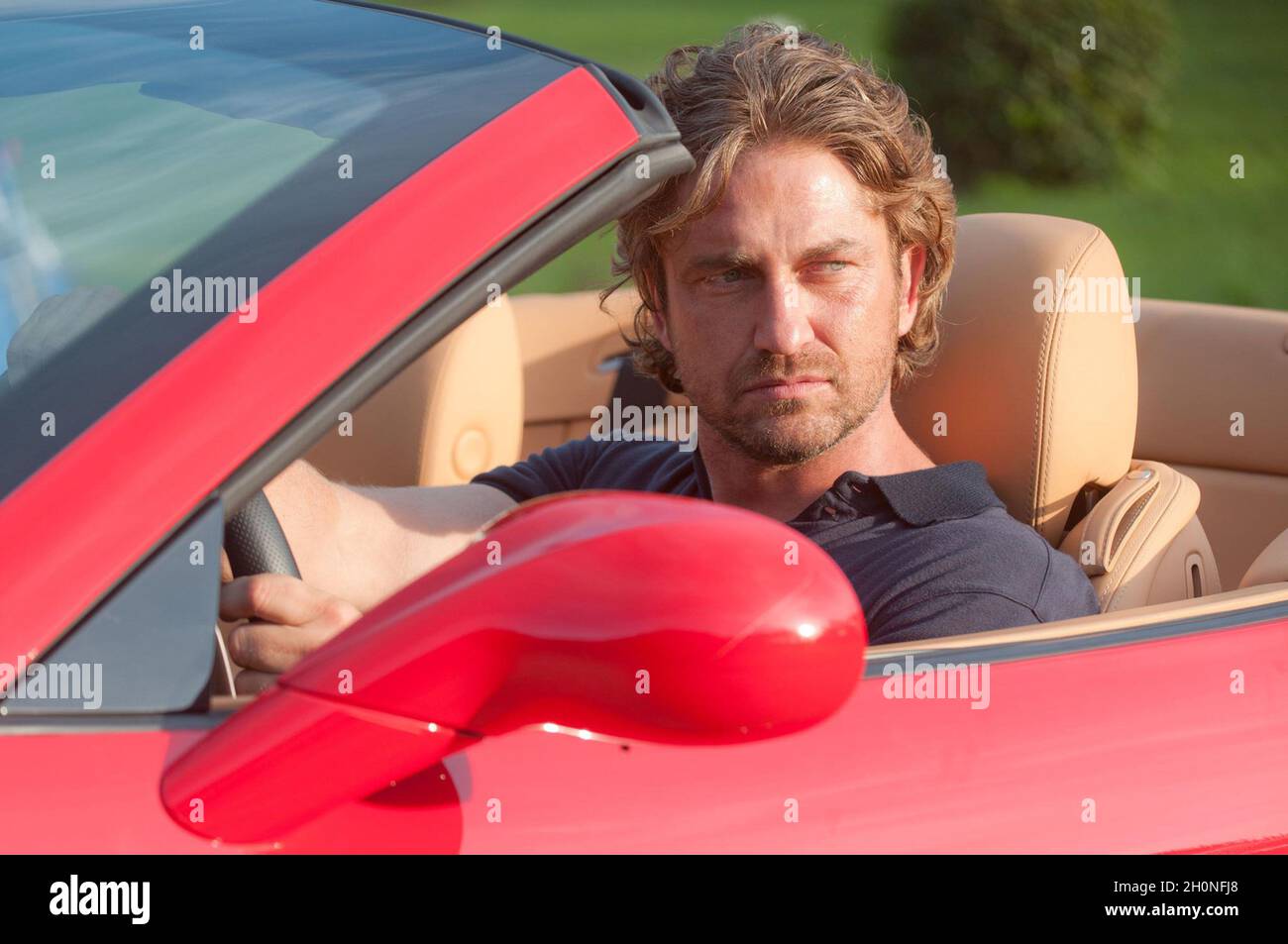 Los Angeles, USA. Gerard Butler in a scene from the FilmDistrict new film: Playing the Field (2012). Plot: A former professional athlete with a weak past tries to redeem himself by coaching his son's soccer team, only to find himself unable to resist when in scoring position with his players' restless and gorgeous moms...  Ref:LMK106-33411-180112 Supplied by LMKMEDIA. Editorial Only. Landmark Media is not the copyright owner of these Film or TV stills but provides a service only for recognised Media outlets. pictures@lmkmedia.com Stock Photo