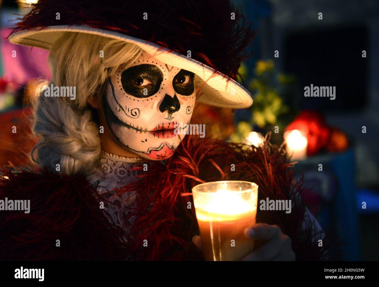 La Catrina, altar on Day of the Dead 2015. Culture of death, popular  celebrations, Mexican festivities, tradition of all saints in Hermosillo,  Mexico. Catrinas, candle (Photo by Isrrael Garnica / NortePhoto) La