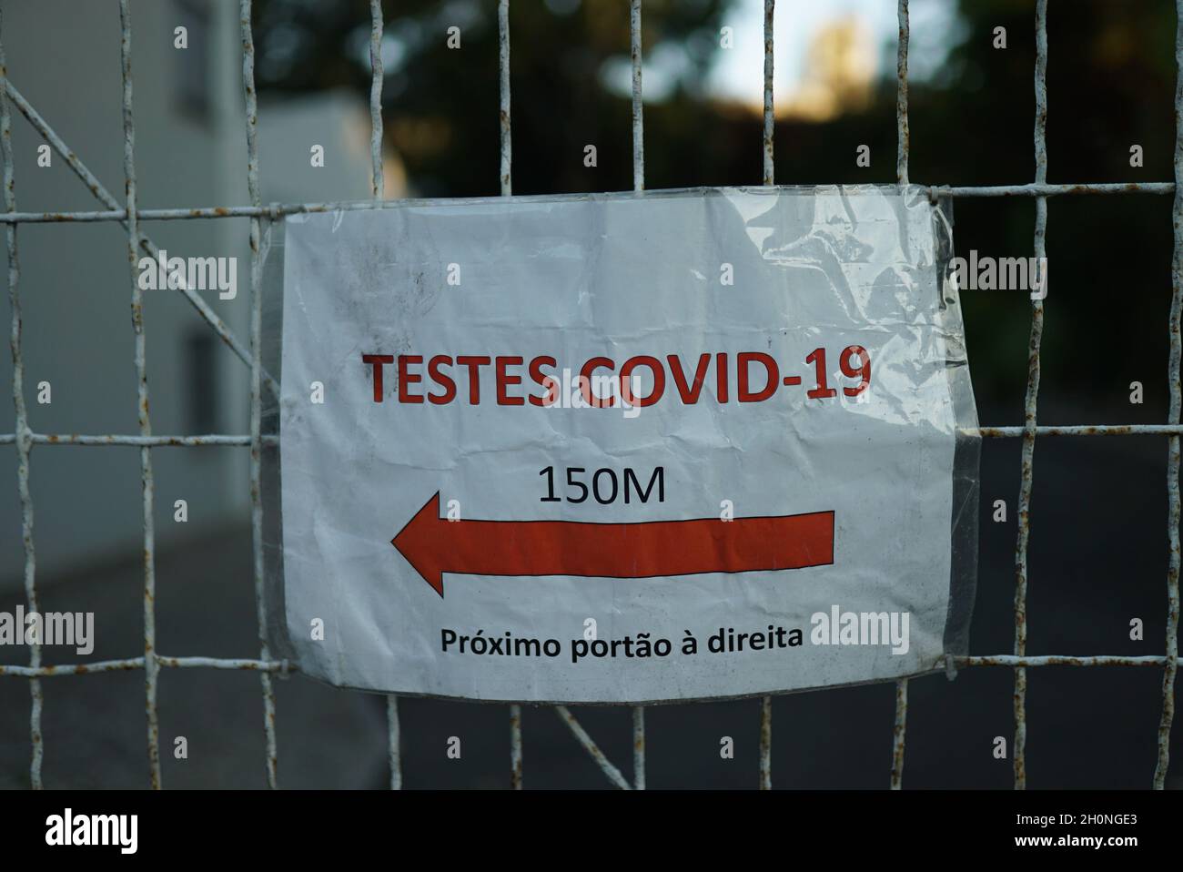 Sign with an arrow pointing in the covid testing area direction ...