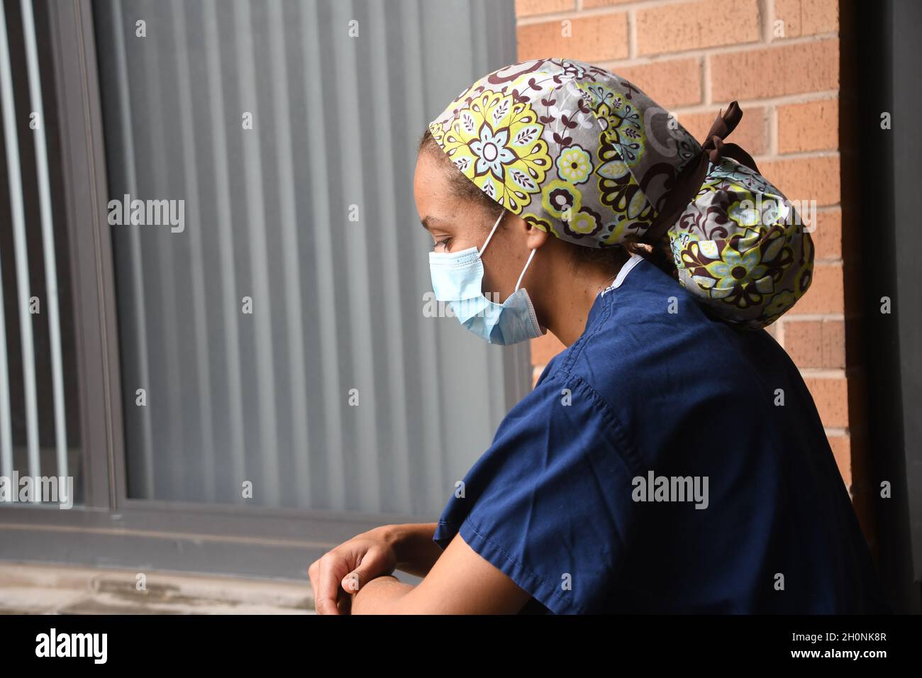 Frustrated and stressed out surgeon during the Covid-19 global pandemic Stock Photo