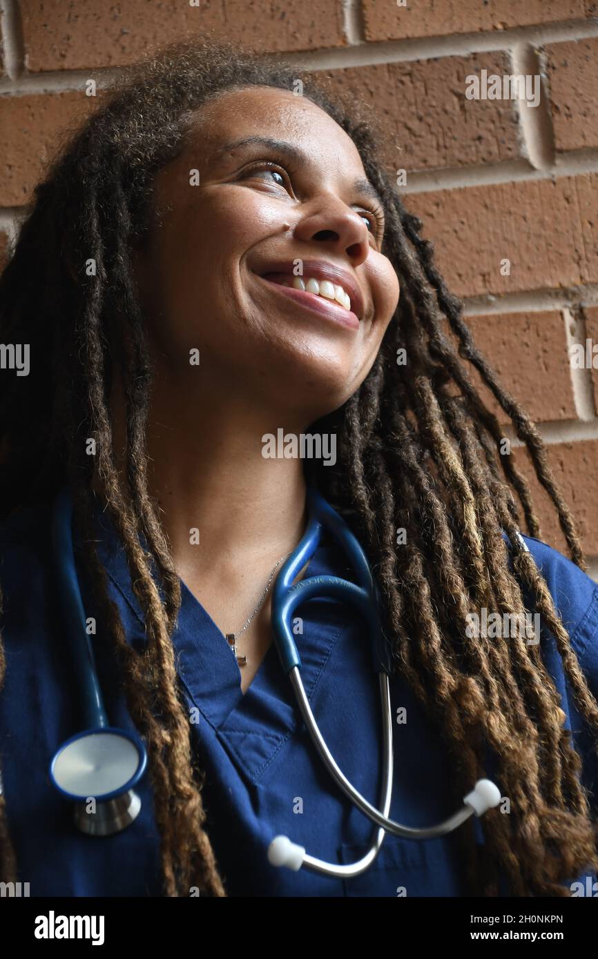 Female doctor with long dreads Stock Photo Alamy