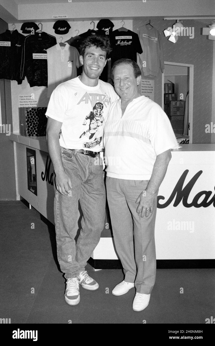 Australian tennis star and gutarist Pat Cash, left, and Jim Marshall, founder of Marshall Amplification, pictured on the Marshall stand at the British Music Fair, Olympia, London, England in 1989. Stock Photo