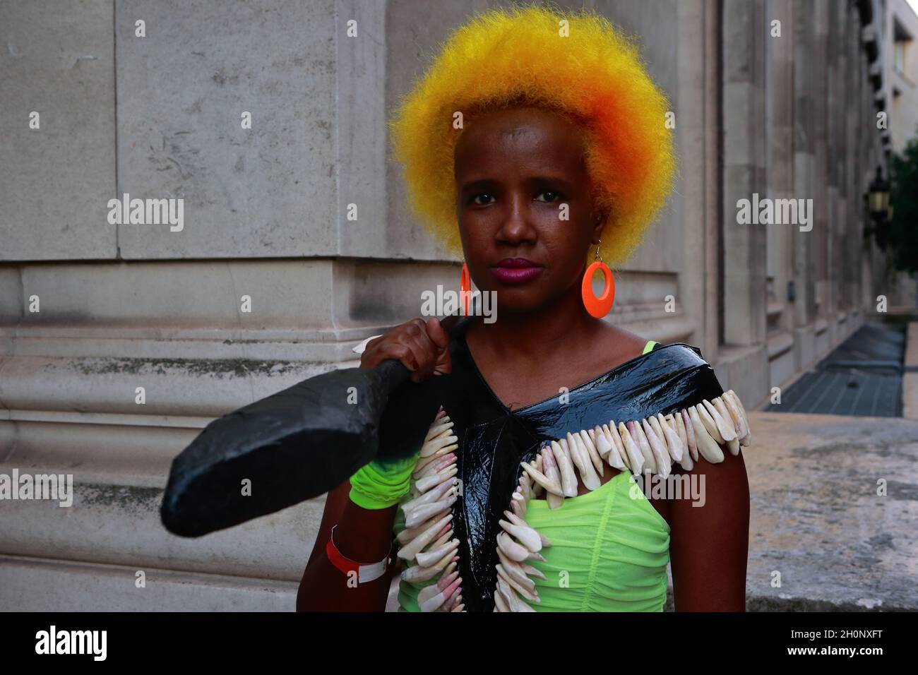 London (UK): 2021 Africa Fashion Week. Out and about, attendees pose for the camera outside Freemasons Hall where the Africa fashion event was held.wo Stock Photo