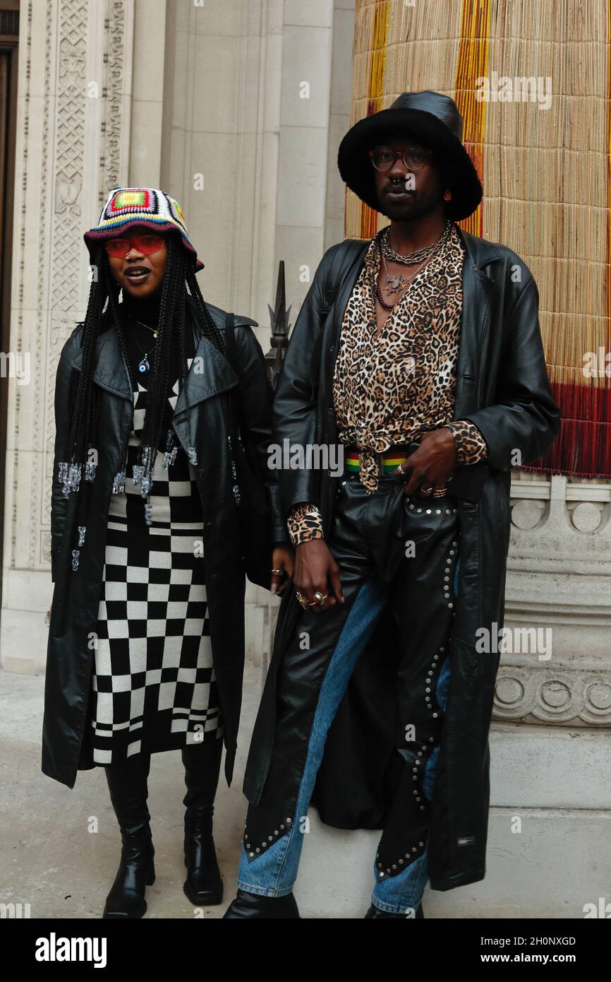 London (UK): 2021 Africa Fashion Week. Out and about, attendees pose for the camera outside Freemasons Hall where the Africa fashion event was held. Stock Photo