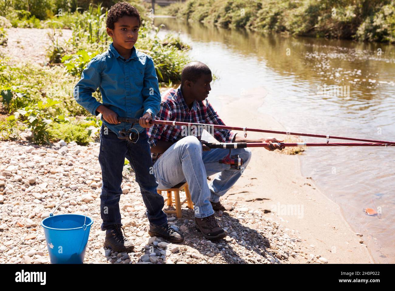Man and his son fishing Stock Photo