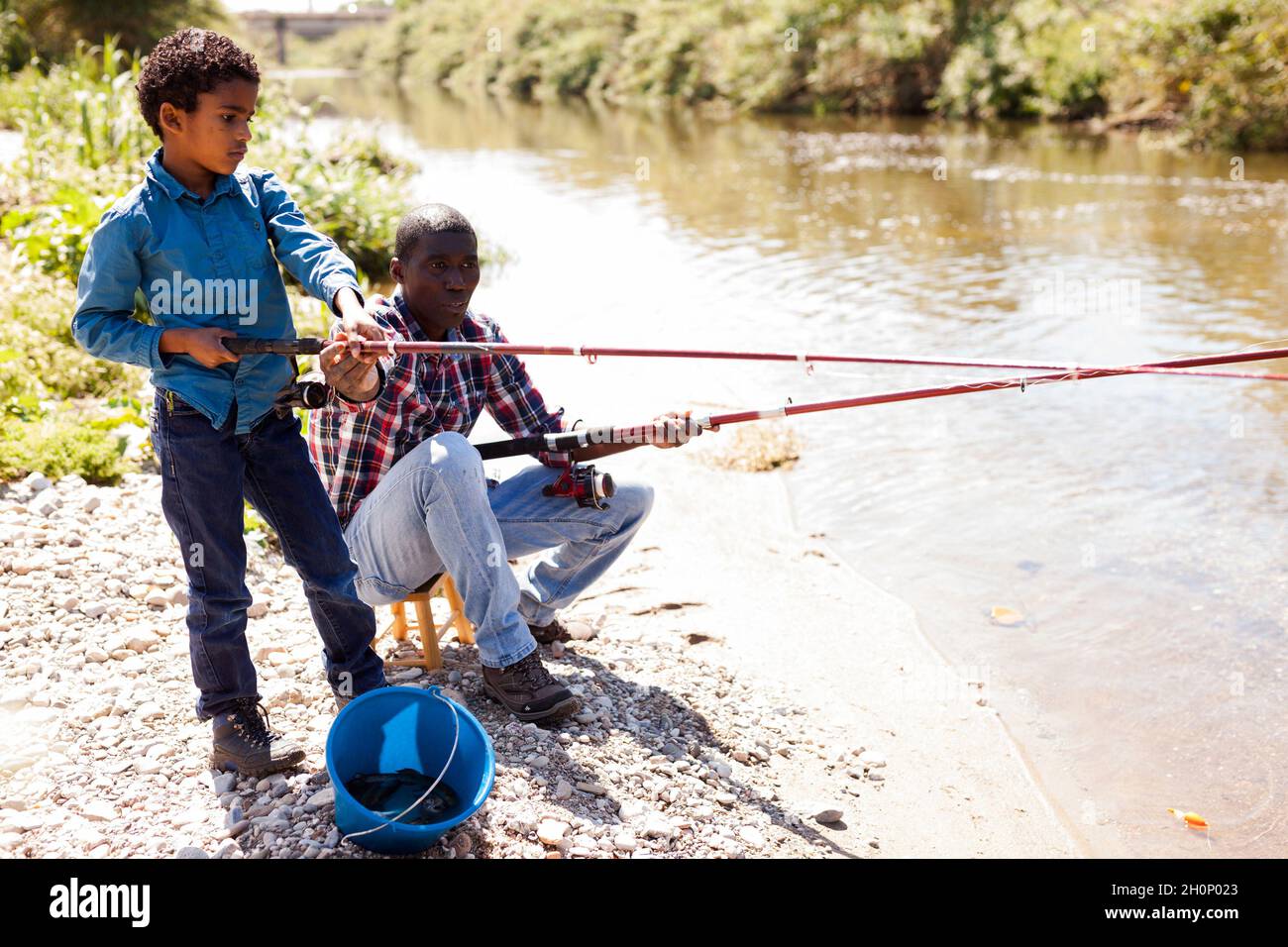 Man and his son fishing Stock Photo