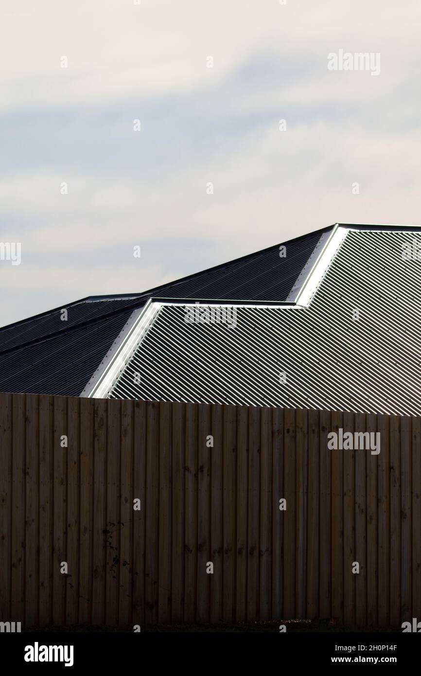 Metal house roof with corrugations. Stock Photo