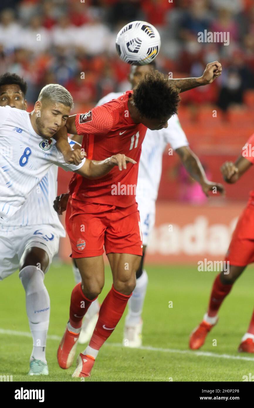 Toronto, Canada, October 13, 2021: Tajon Buchanan, No. 11, of Team Canada competes for the ball against Cristian Martínez, No. 8, of Team Panama during the CONCACAF FIFA World Cup Qualifying 2022 match at BMO Field in Toronto, Canada. Canada won the match 4-1. Stock Photo