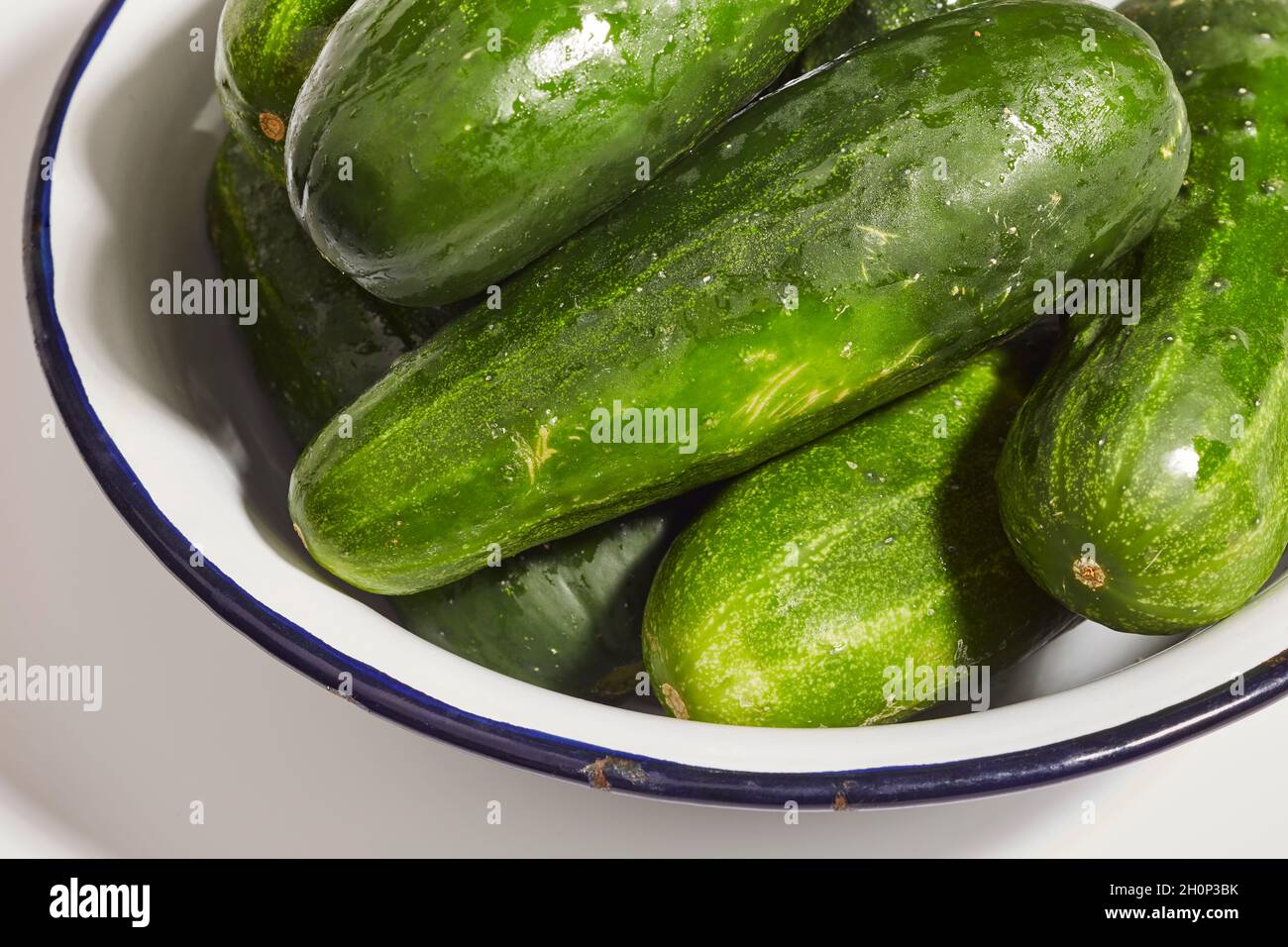A bowl of fresh, ripe, Kirby cucumbers Stock Photo