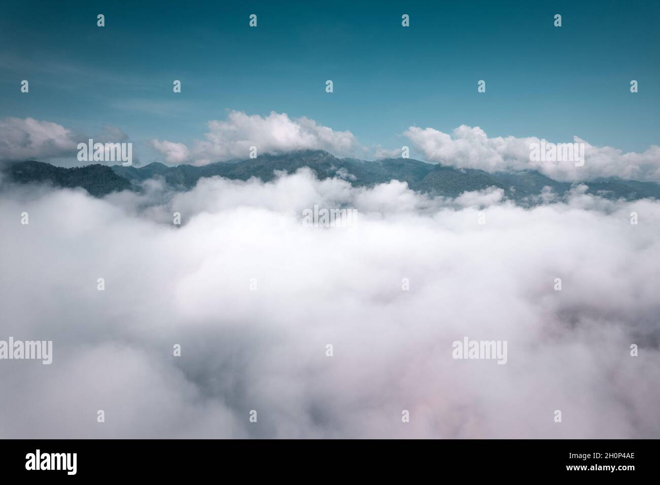 fog and mountains in the morning high angle form drone Stock Photo - Alamy