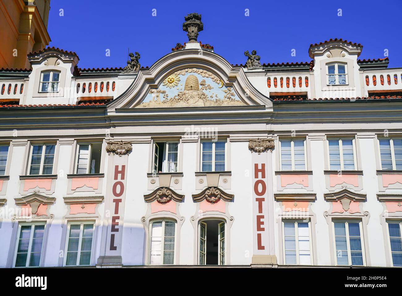 Prague Czech Republic -August 30 2017; Front facade of Hotel Prague Inn with its ornate architecture and beehive image Stock Photo