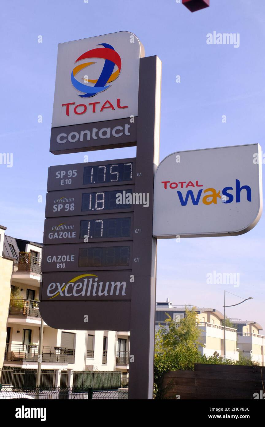 The prices of petrol and diesel are displayed on a sign at the entrance