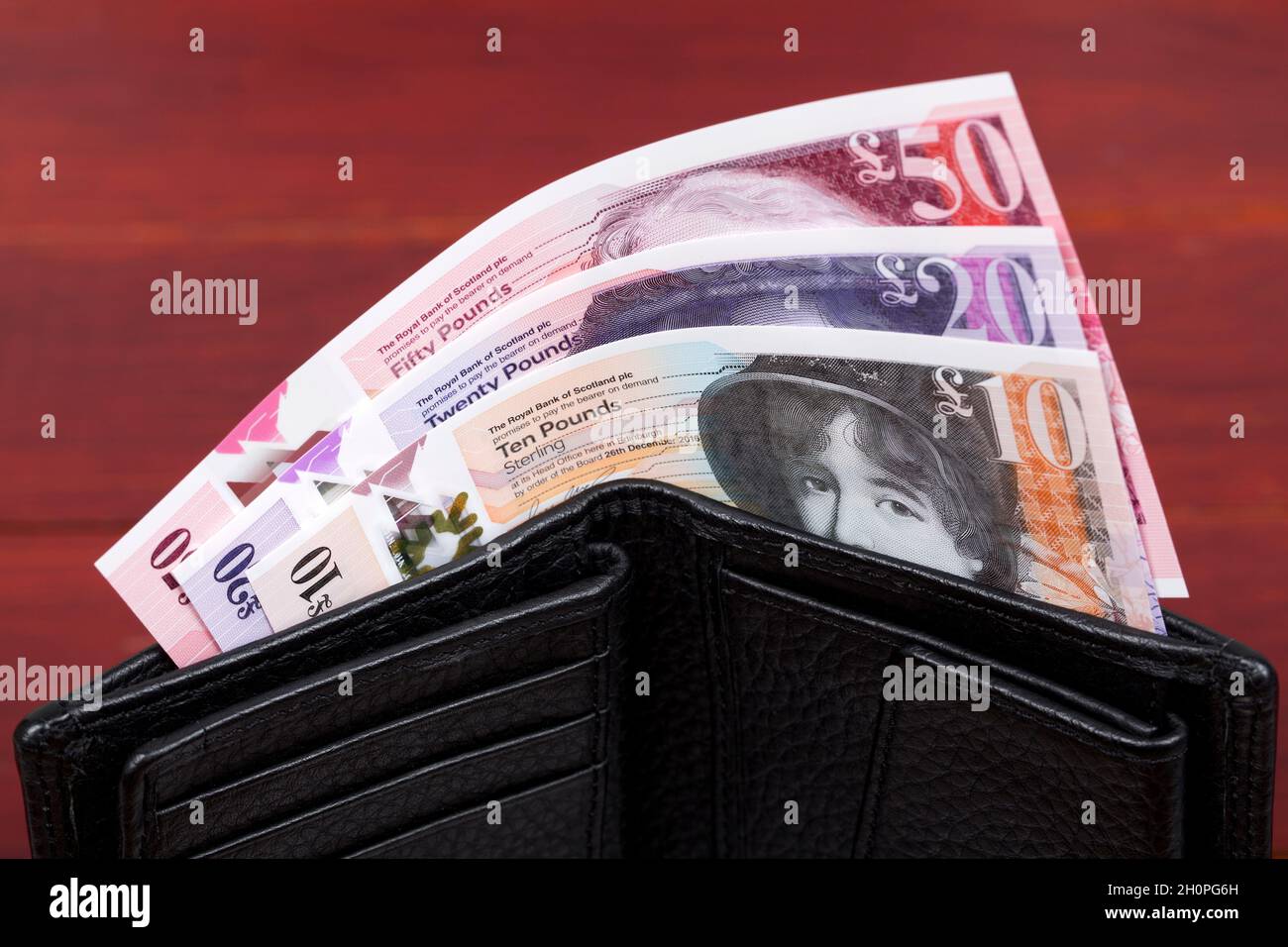Scottish money - Pound in the black wallet Stock Photo