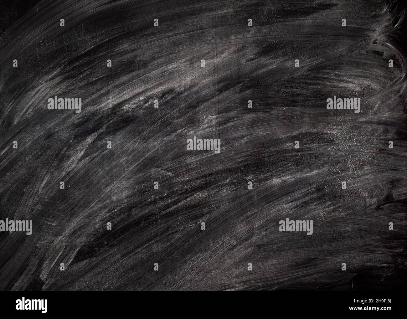 Blank chalkboard. Chalk rubbed out on blackboard. Background image Stock Photo