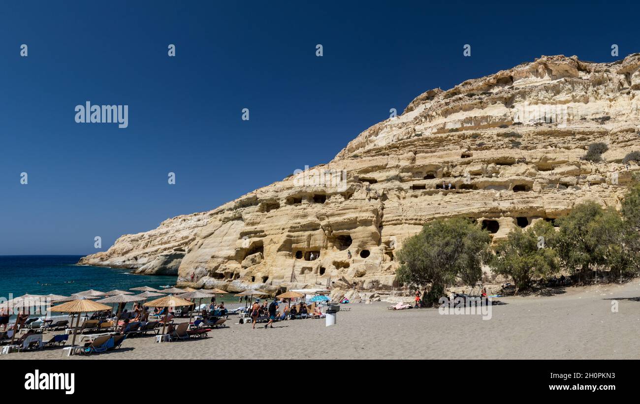 Dwelling caves of the hippies in Matala Stock Photo