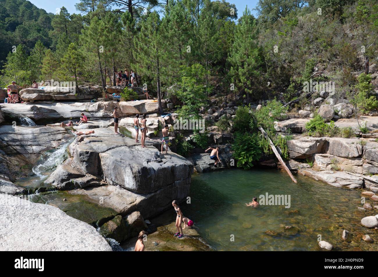 Corse du Sud department (southern Corsica): the Cavu Valley (or Cavo) with its natural pools. Very popular with tourists in summer, with bathers in th Stock Photo