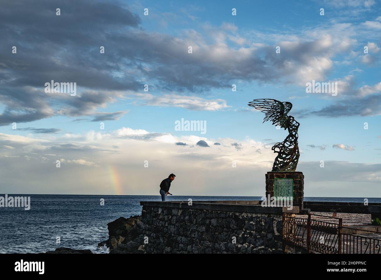 The rainbow beyond Winged Nike at Giardini Naxos Stock Photo