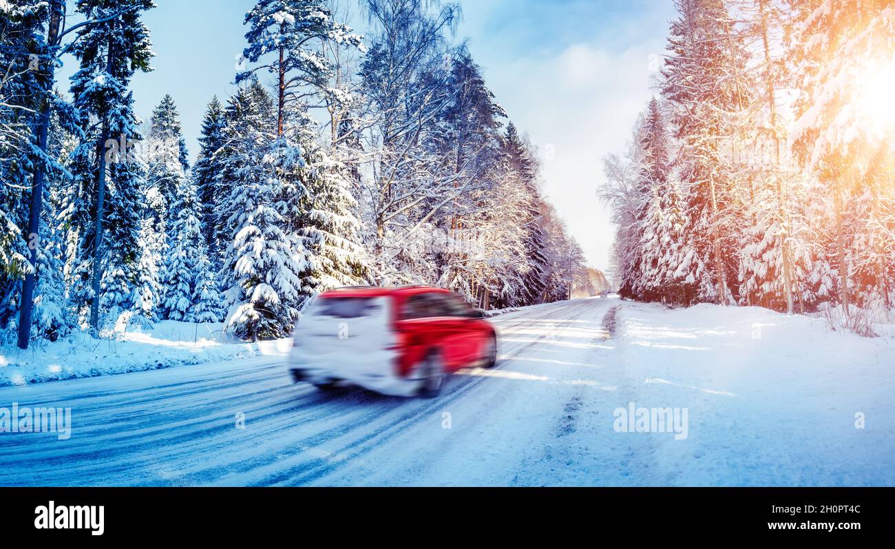 Beautiful snowy country road in winter with cars on it Stock Photo - Alamy