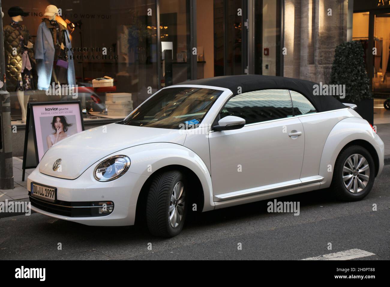 DUSSELDORF, GERMANY - SEPTEMBER 19, 2020: VW New Beetle small convertible car parked in Germany. There were 45.8 million cars registered in Germany (a Stock Photo