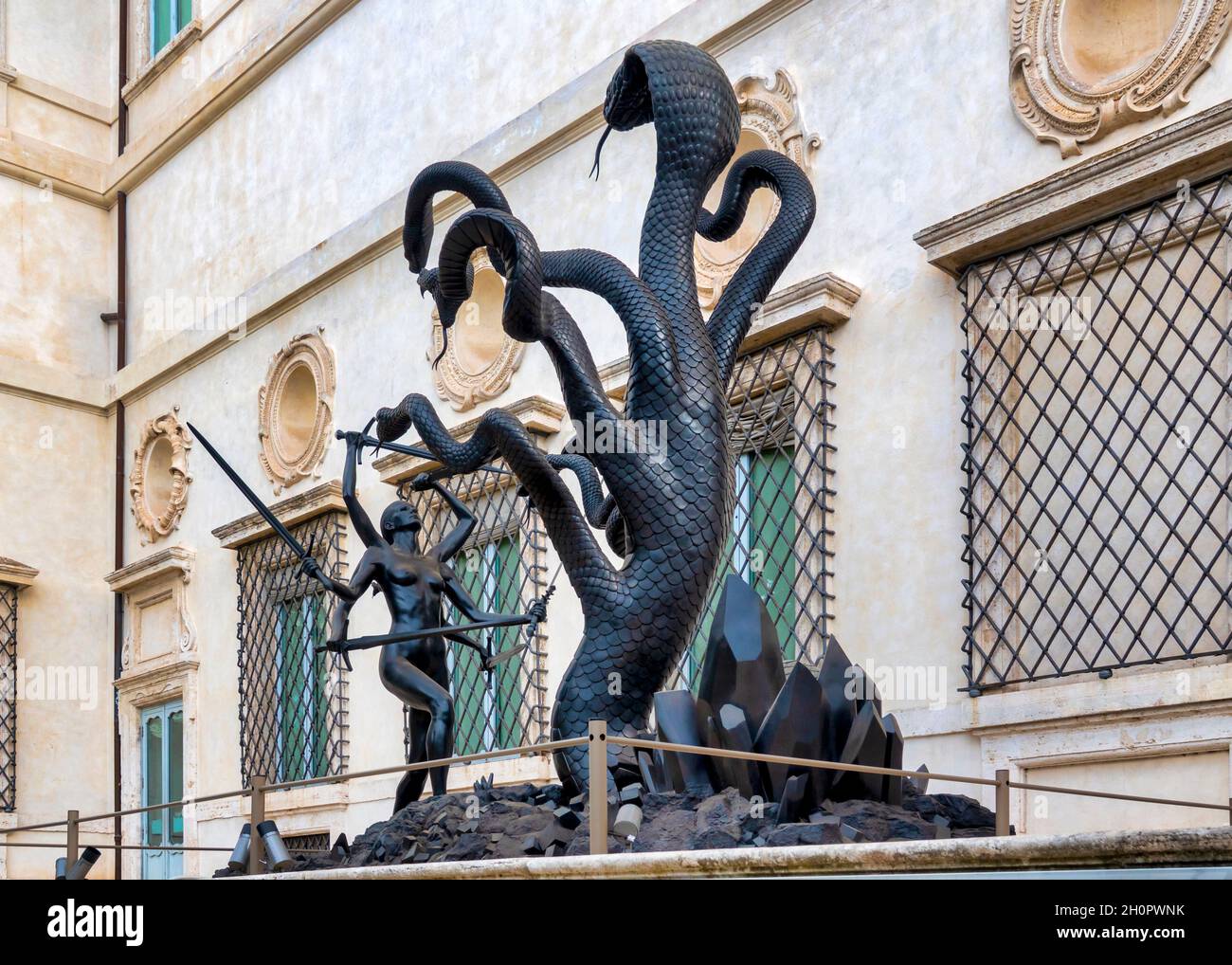 Hydra and Kali by Damien Hirst is displayed outdoors in the Giardino Segreto of the Uccelliera in the Galleria Borghese, Rome, Italy Stock Photo