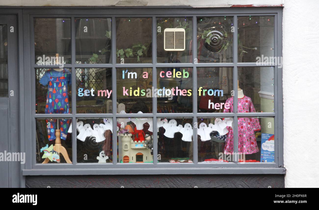 The window of a children's clothes shop in Abergele town in North Wales decorated for I'm A Celebrity Get Me Out of Here 2020 Stock Photo