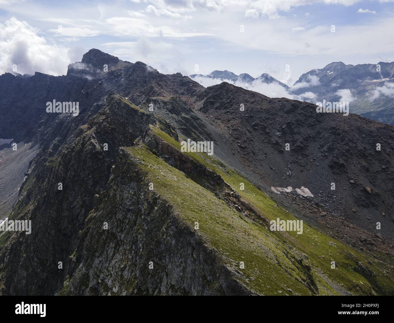 Beautiful view of green mountains and forests under the cloudy sky ...