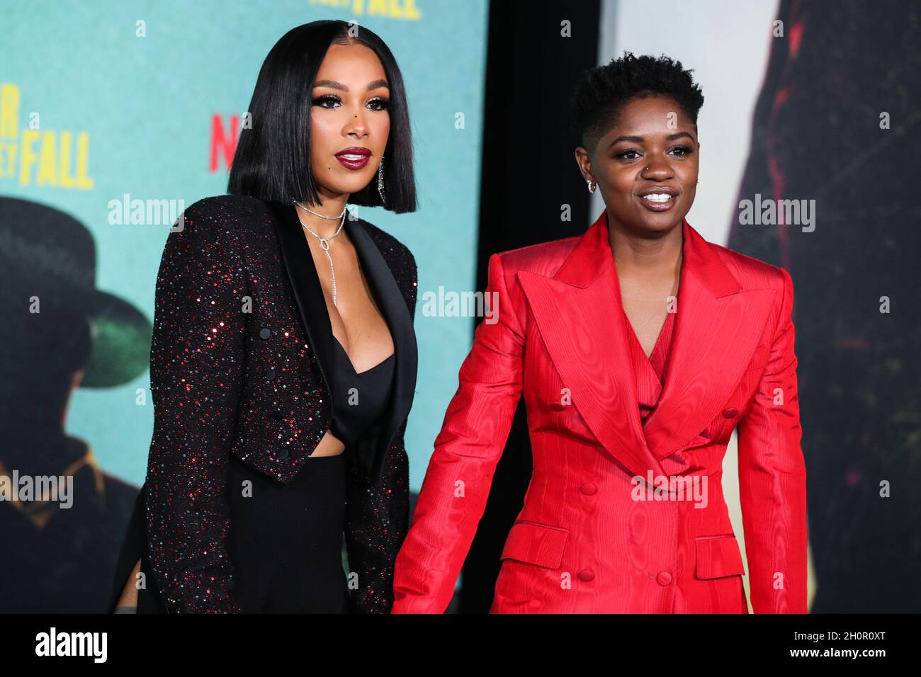 LOS ANGELES, CALIFORNIA, USA - OCTOBER 13: Chris Amore and actress/rapper Bre-Z (Calesha Murray) arrive at the Los Angeles Premiere Of Netflix's 'The Harder They Fall' held at the Shrine Auditorium and Expo Hall on October 13, 2021 in Los Angeles, California, United States. (Photo by Xavier Collin/Image Press Agency) Stock Photo