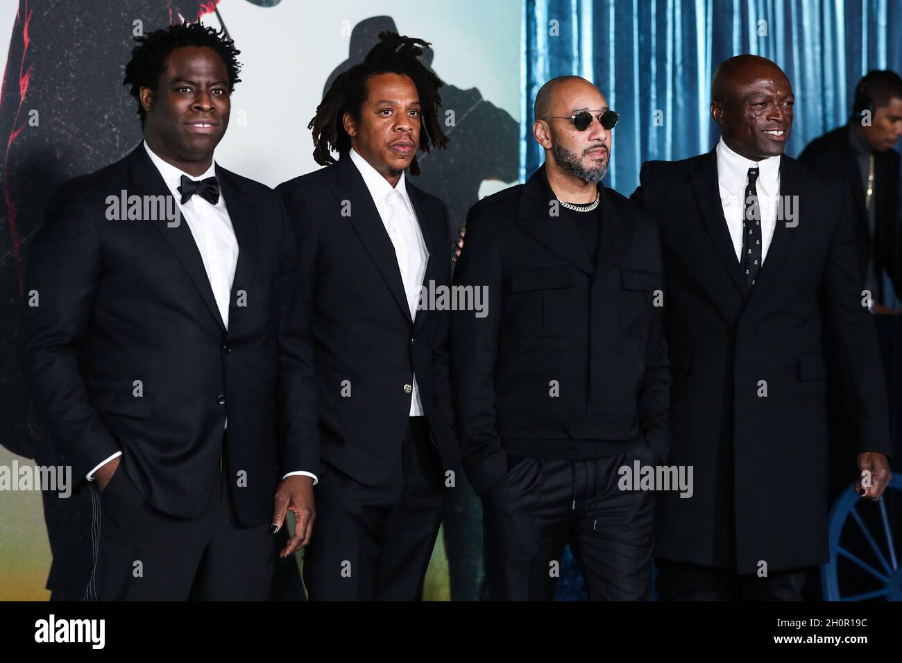 LOS ANGELES, CALIFORNIA, USA - OCTOBER 13: Director Jeymes Samuel, rapper/producer Jay-Z (Shawn Corey Carter), record producer Swizz Beatz (Kasseem Daoud Dean) and singer-songwriter Seal (Henry Olusegun Adeola Samuel) arrive at the Los Angeles Premiere Of Netflix's 'The Harder They Fall' held at the Shrine Auditorium and Expo Hall on October 13, 2021 in Los Angeles, California, United States. (Photo by Xavier Collin/Image Press Agency) Stock Photo