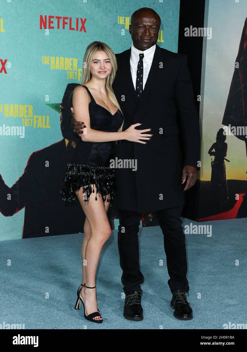 LOS ANGELES, CALIFORNIA, USA - OCTOBER 13: Model Leni Olumi Klum and singer-songwriter Seal (Henry Olusegun Adeola Samuel) arrive at the Los Angeles Premiere Of Netflix's 'The Harder They Fall' held at the Shrine Auditorium and Expo Hall on October 13, 2021 in Los Angeles, California, United States. (Photo by Xavier Collin/Image Press Agency) Stock Photo