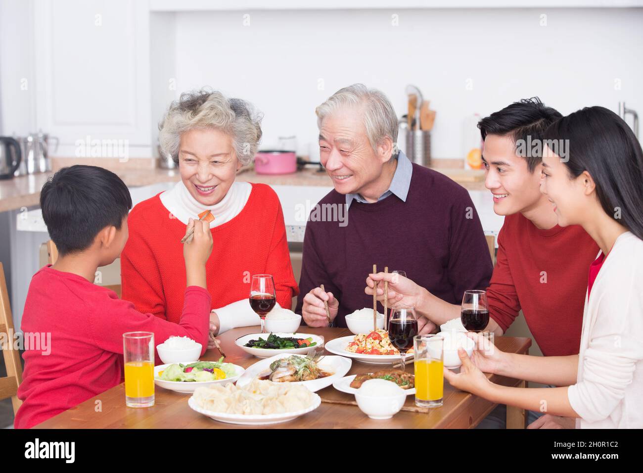 Families having a reunion dinner on New Year's Day Stock Photo