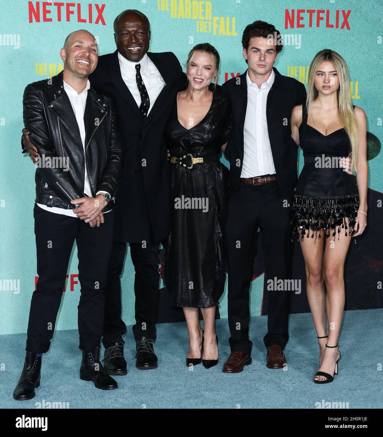 LOS ANGELES, CALIFORNIA, USA - OCTOBER 13: Singer-songwriter Seal (Henry Olusegun Adeola Samuel), girlfriend Laura Strayer, Aris Rachevsky and model Leni Olumi Klum arrive at the Los Angeles Premiere Of Netflix's 'The Harder They Fall' held at the Shrine Auditorium and Expo Hall on October 13, 2021 in Los Angeles, California, United States. (Photo by Xavier Collin/Image Press Agency) Stock Photo