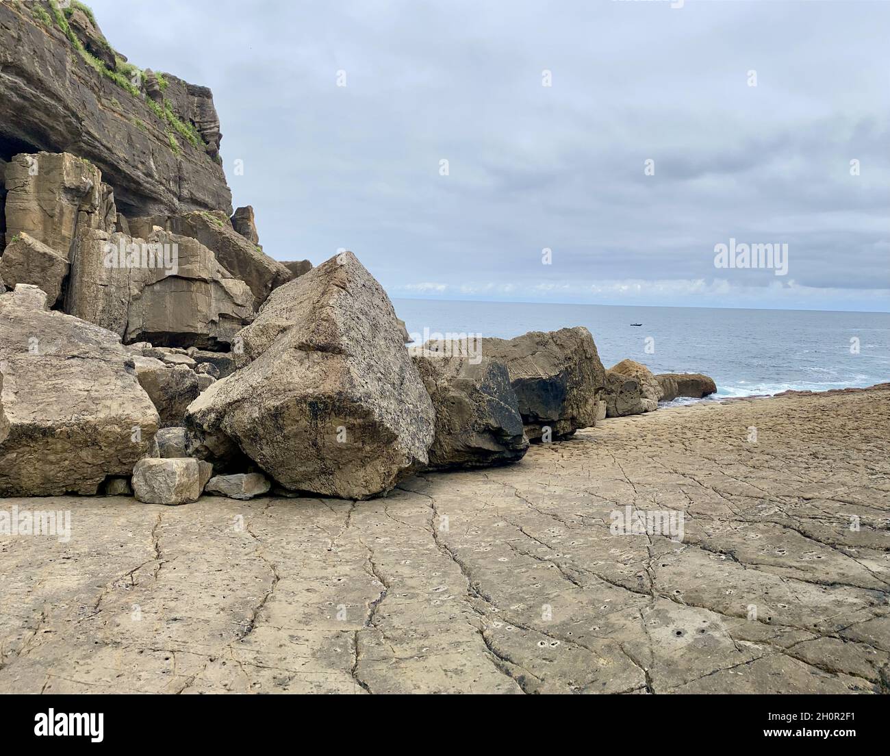 Beautiful view of a beach under the cloudy sky Stock Photo - Alamy