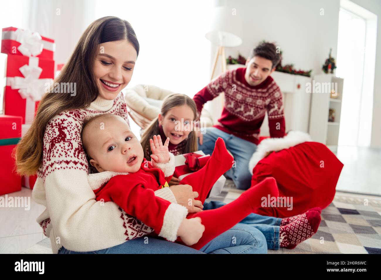 Photo of young cheerful family happy positive smile childhood brother  sister christmas time spirit indoors Stock Photo - Alamy