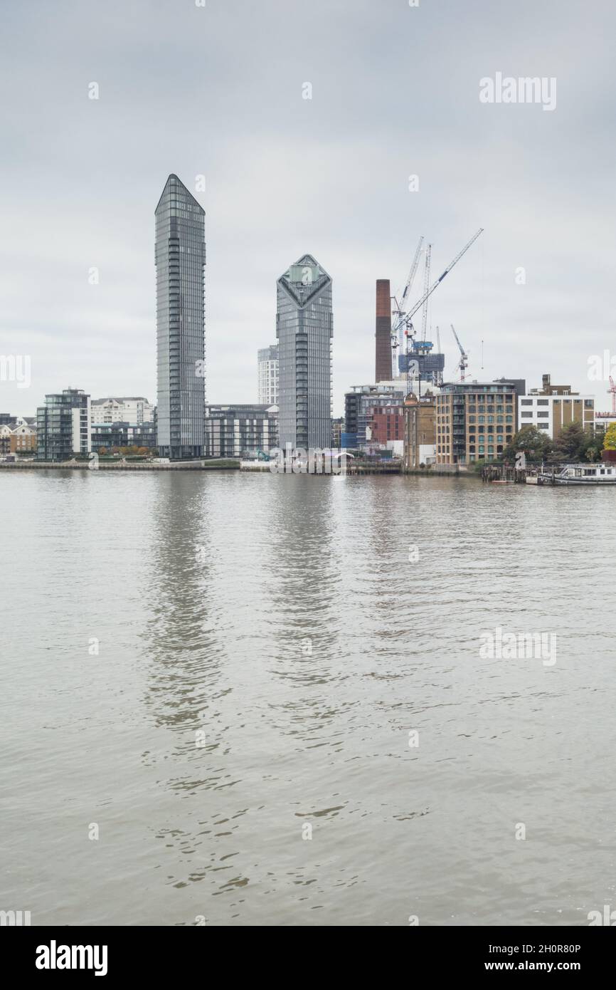 Reflections of Chelsea Harbour apartments cast their shadow on The