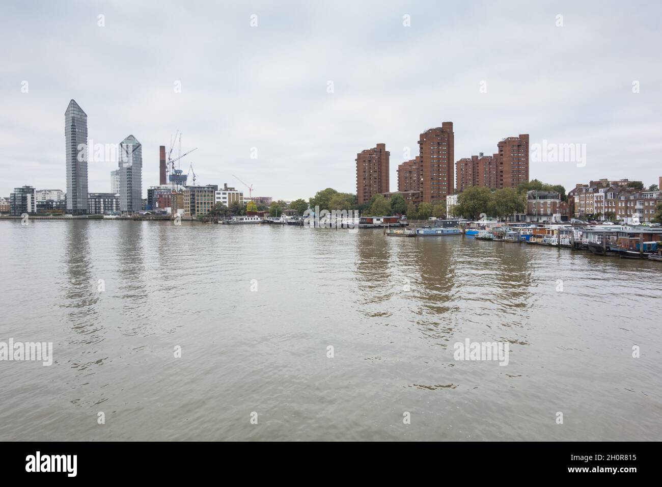 Reflections of Chelsea Harbour and World's End apartments cast their