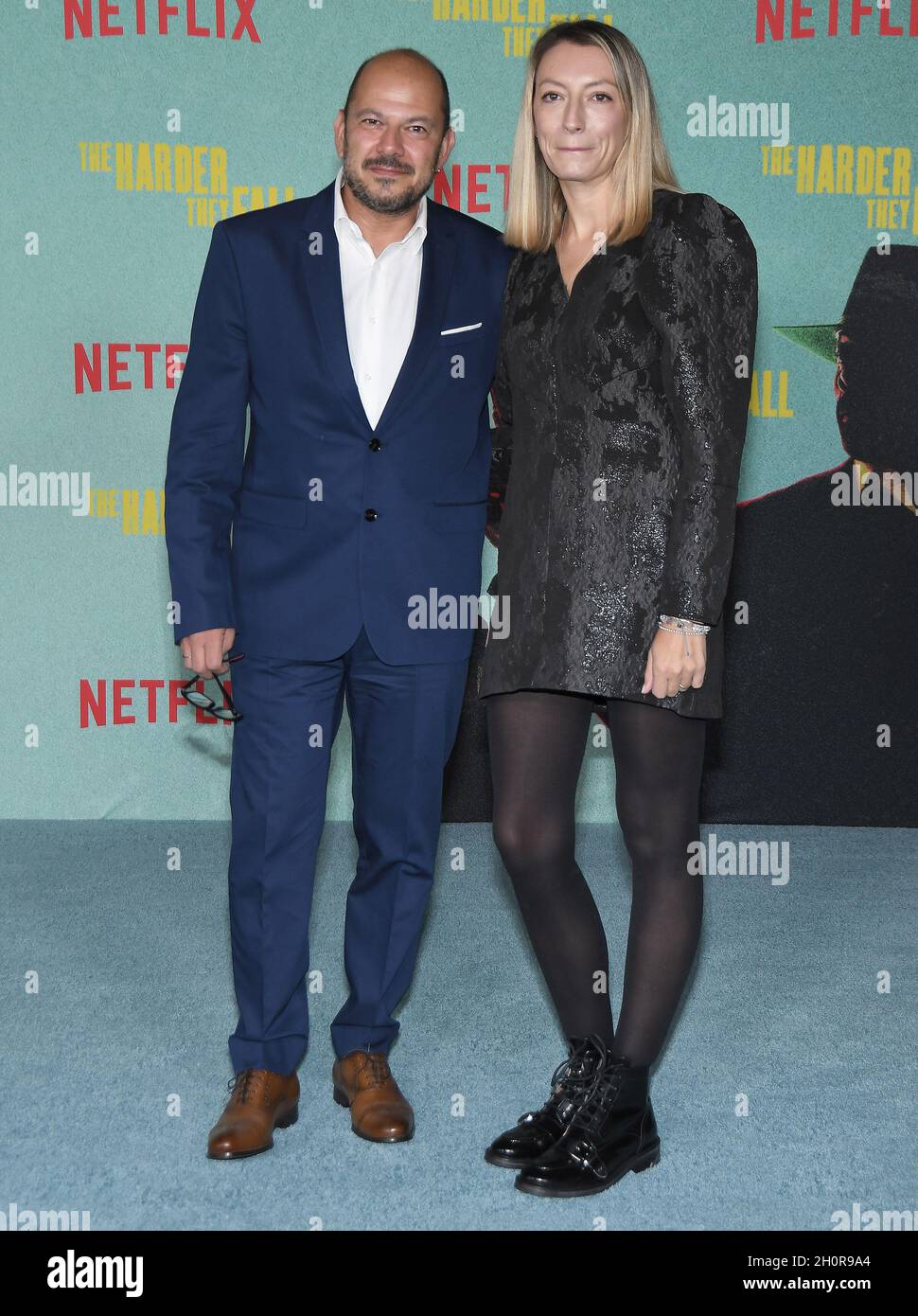 (L-R) Mihai Malaimare and Elena Cozlovschi arrives at THE HARDER THEY FALL Los Angeles Special Screening held at The Shrine in Los Angeles, CA on Wednesday, ?Octoberber 13, 2021. (Photo By Sthanlee B. Mirador/Sipa USA) Stock Photo