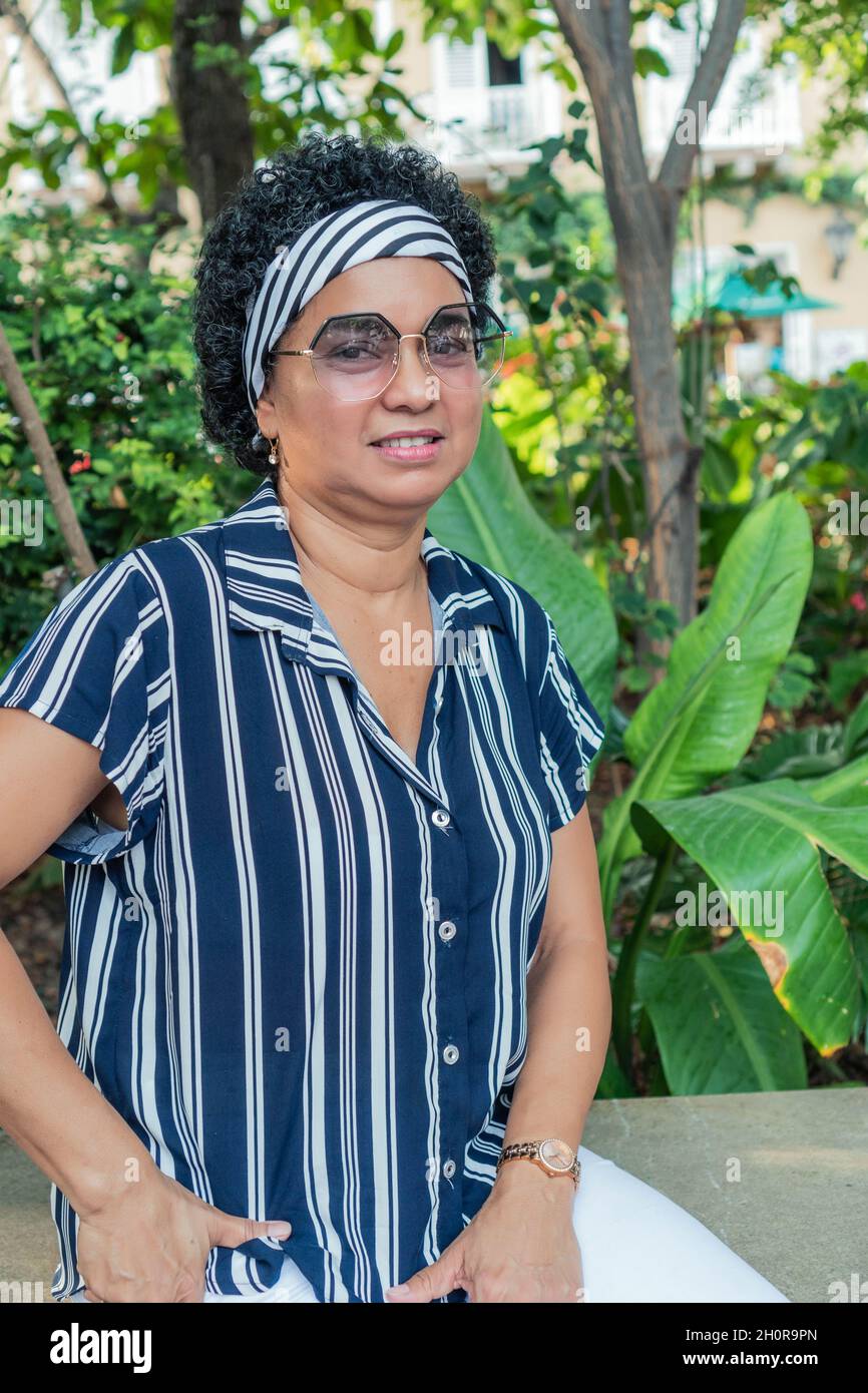 Older mixed race woman smiling hi-res stock photography and images - Alamy