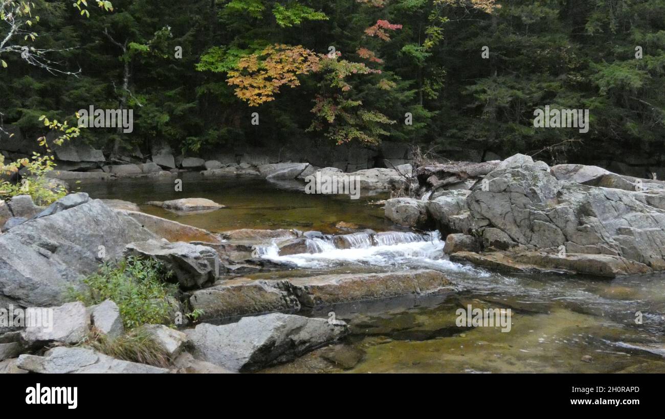 Beautiful shot of a waterfall in a forest Stock Photo - Alamy