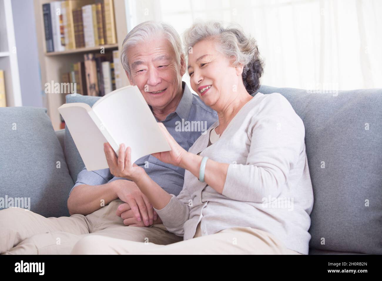 Stay At Home Elderly Couple Reading Books Stock Photo Alamy