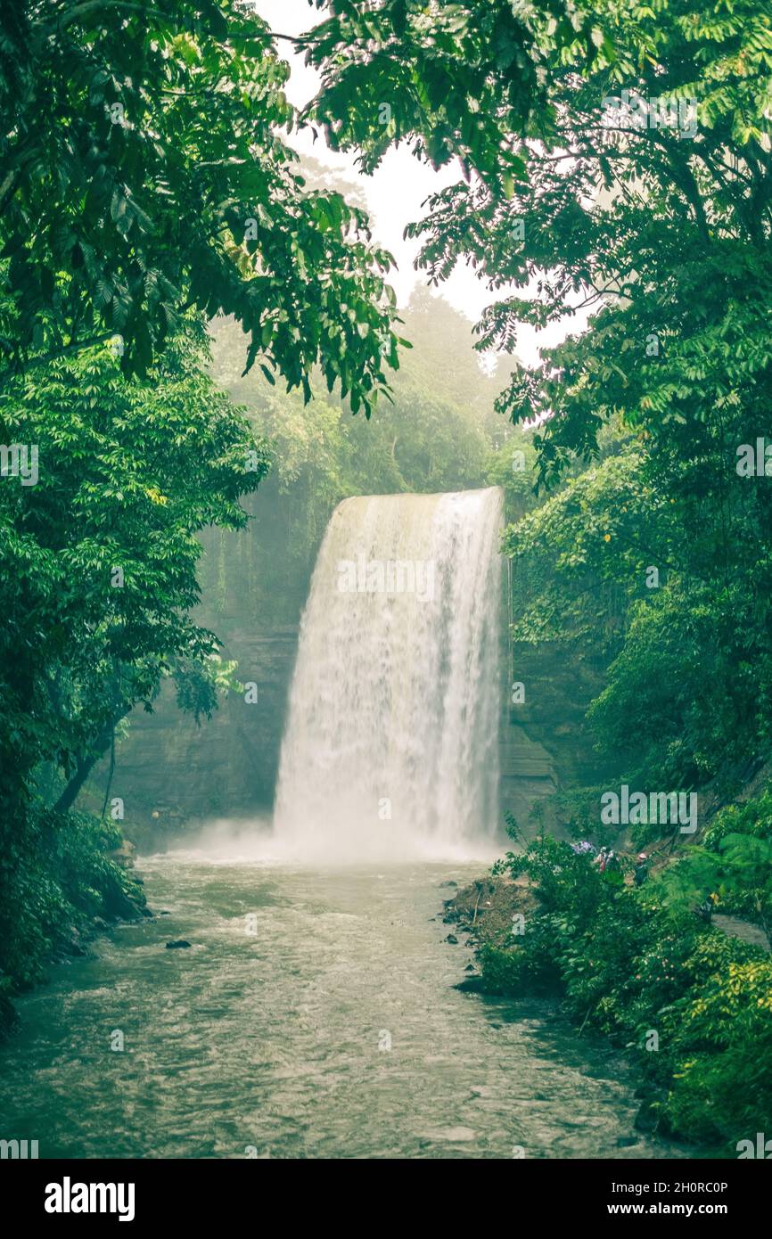 LAKE SEBU, PH - AUG. 29, 2021: The first falls “Hikong Alo” of 35 feet high out of Lake Sebu's seven falls in Brgy.  Siloton, Lake Sebu, South Cotabat Stock Photo