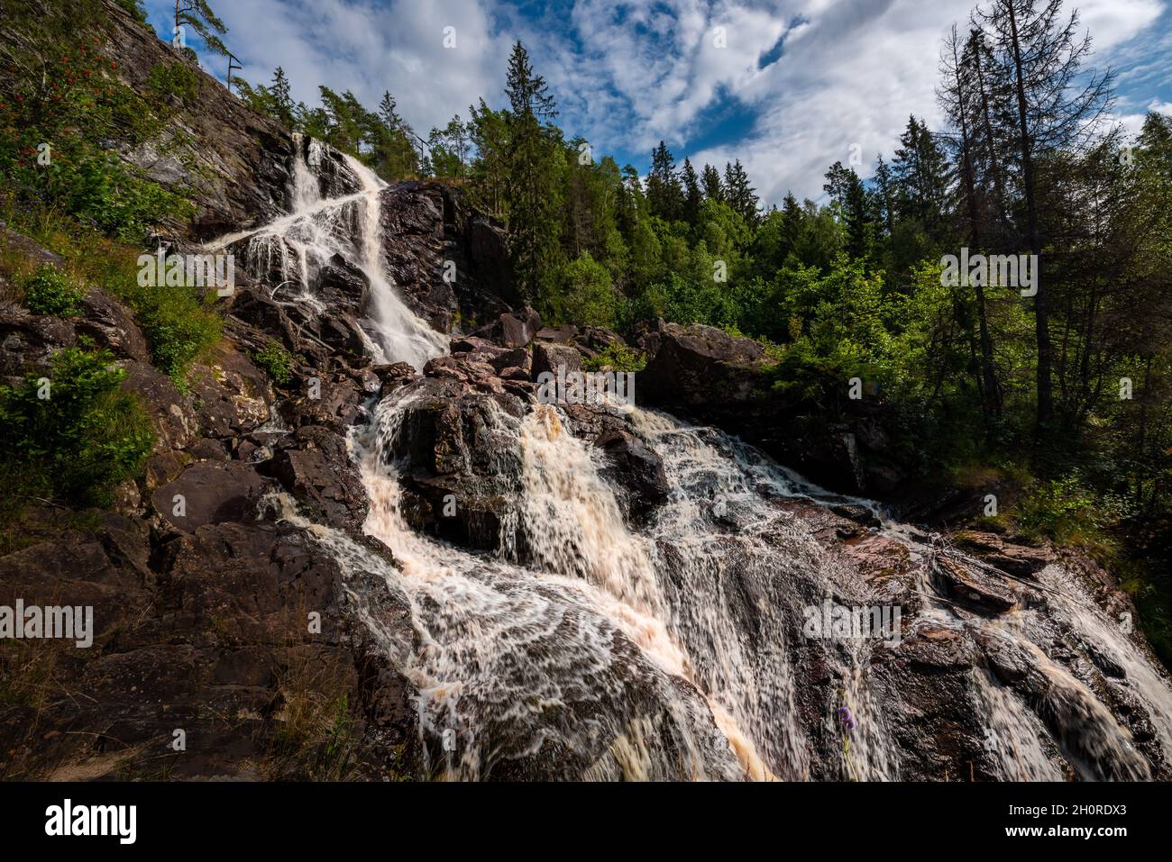 Elgafossen - Algafallet Waterfall located between two countries Sweden and Norway on Elja River Stock Photo