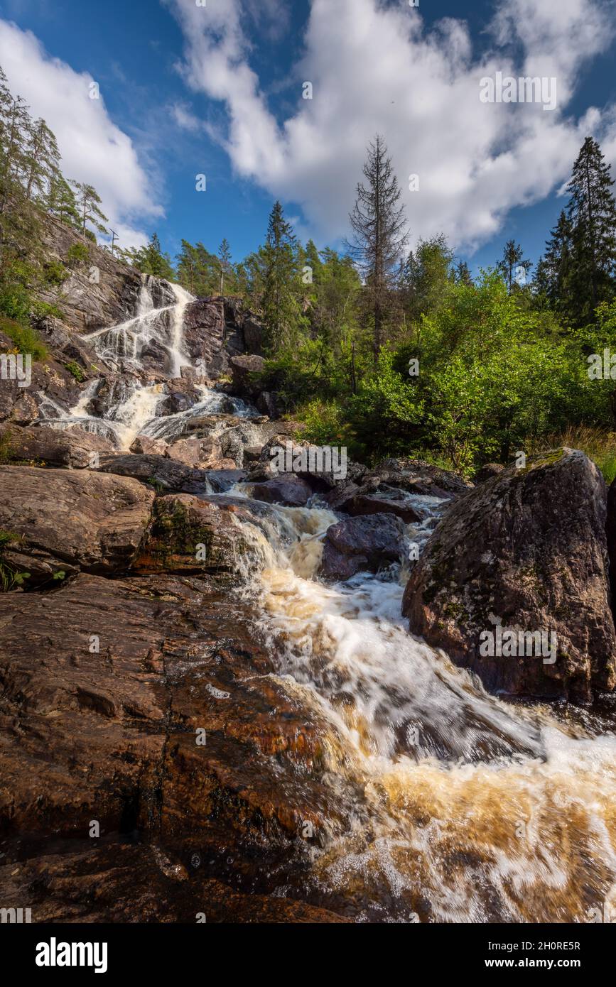 Elgafossen - Algafallet Waterfall located between two countries Sweden and Norway on Elja River Stock Photo